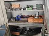 a metal cabinet that has many items in it