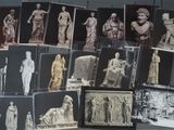 a lot of pictures of statues on display together