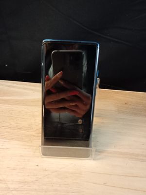une personne se prenant en photo dans un miroir