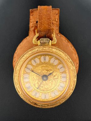 DUJARDIN. Montre gousset à boitier en métal doré largement c…