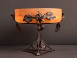 an image of a table lamp with leaves on it