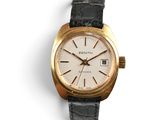 an image of a gold watch with a white dial on a black leather strap