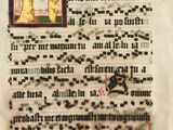an old manuscript with a picture of a man on a horse