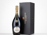 a bottle of champagne in front of a black box
