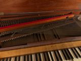 a piano that is sitting on the floor