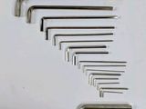 a set of hex wrens are arranged on a white surface