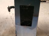 an image of a blue machine with a hole in it