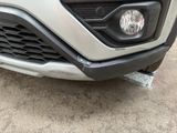 a close up of the front bumper of a car