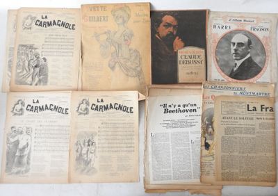 several old french books are stacked on a white surface