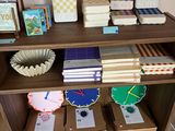a book shelf with many books on top of it