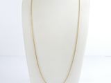 a gold chain necklace on a mannequin mannequin mannequin mannequin mannequin mannequin mannequin mannequin manne