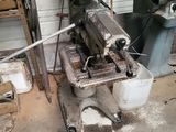 a machine that is sitting inside of a garage
