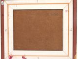 an old picture frame with a brown background and a white border