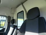 a view of the inside of a bus from the driver ' s seat