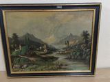 une vieille photo représentant un tableau représentant un paysage de montagne posé sur une table