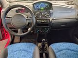 a small car with a steering wheel and a dash board