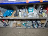 a shelf with many items on it in a room