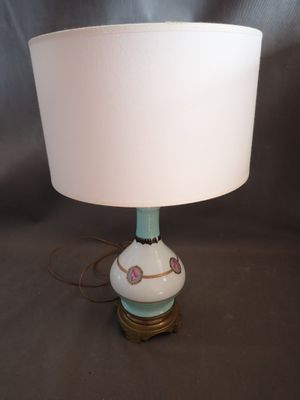 an image of a lamp with a white shade on it
