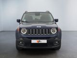 the front view of a blue jeep compass parked in a room