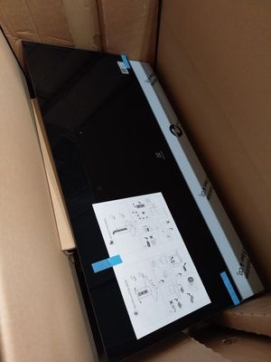 a laptop sitting in the back seat of a car