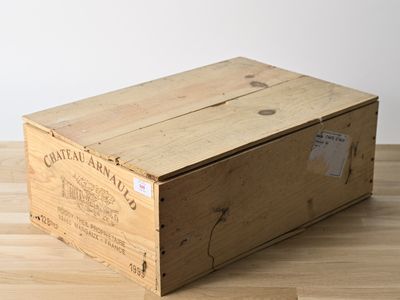 a wooden box sitting on a wooden floor