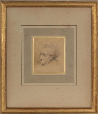 a drawing of a man ' s head in a gold frame
