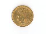 an image of a gold coin with a headdress on top of it