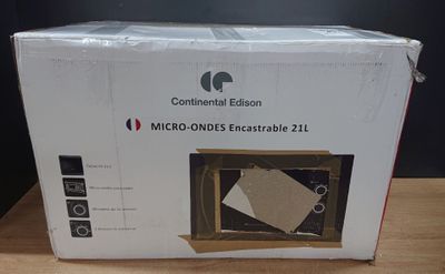 packaging of a boxed box with a picture of a clock inside of it