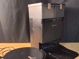 a coffee maker that is sitting on a table