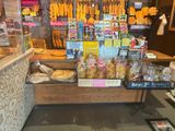 a display of breads and pastries in a store