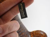 a person holding a tag in their hand