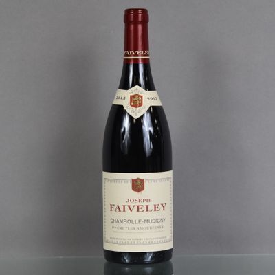 a bottle of wine that is sitting on a table
