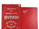 a close up of a red book with a label on it