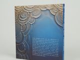 a book that has a picture of clouds on it