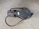 an overhead view of a blower sitting on a concrete floor