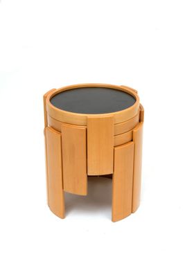 an image of a wooden table with a black top on a white background