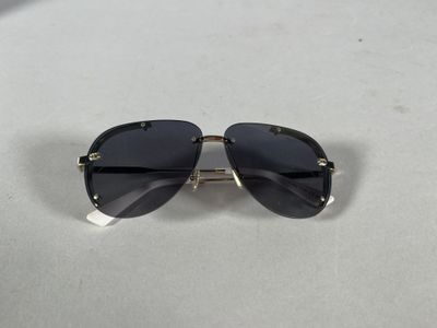 a pair of sunglasses sitting on top of a table