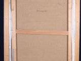 an easel with a painting on it and a piece of cardboard on the top of it