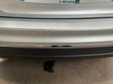 a car that is parked on the side of the street