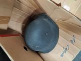 a hat that is sitting on top of a cardboard box