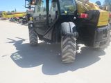 a tractor that is parked in the parking lot