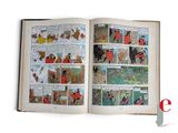an open book with pictures of people and animals on it