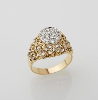 an 18k gold and diamond ring