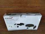 the box of a nintendo wii game system sitting on a wooden table