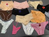 a lot of underwear that are on a table