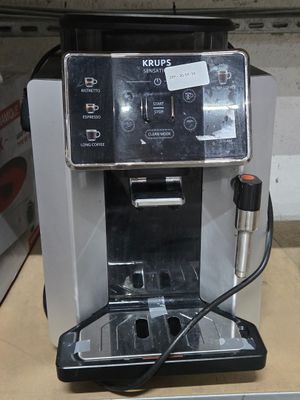 a coffee machine that is sitting on top of a table