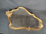 a mirror that is sitting on a table