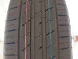 a close up of a tire with a red line on the side of it