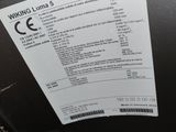 a label on the back of a washing machine