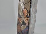 a box with a picture of a man holding a gun in it